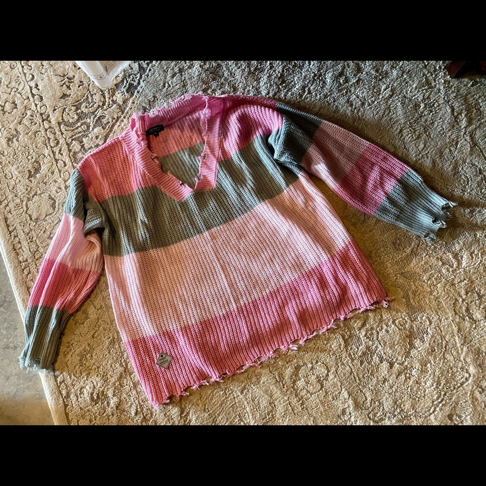 Distressed sweater